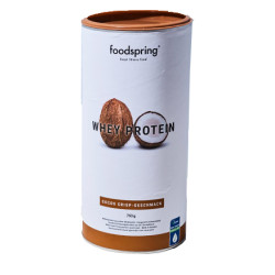 Barattolo da 750 grammi di whey protein in polvere Foodspring gusto cocco croccante